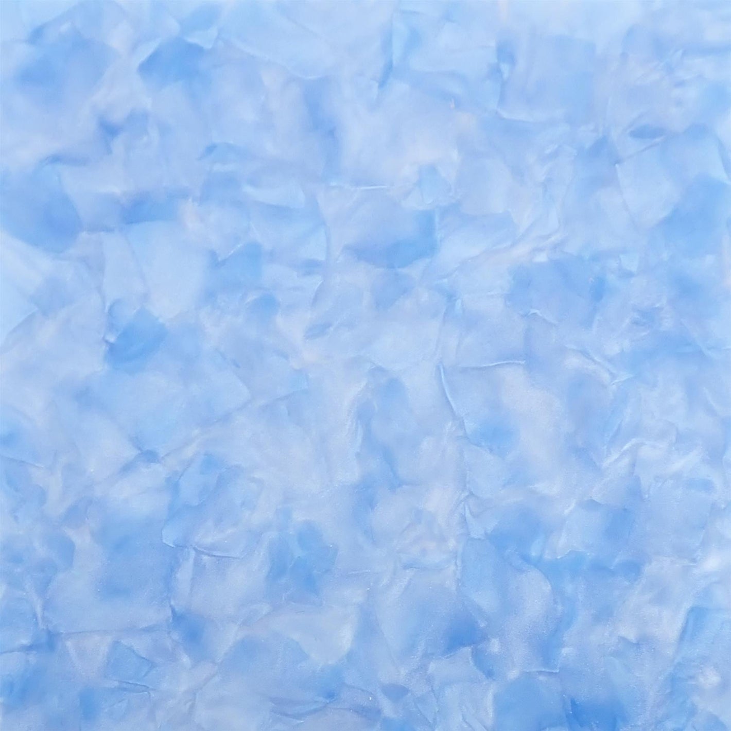 Pearloid sheets showing iridescent mother-of-pearl patterns