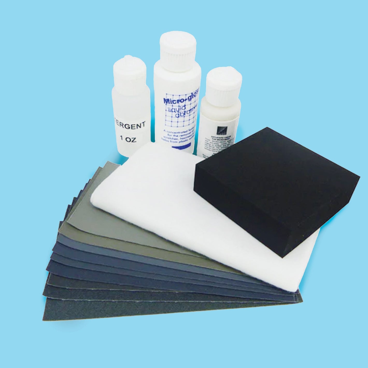 Selection of sandpaper, abrasive sheets and sanding supplies